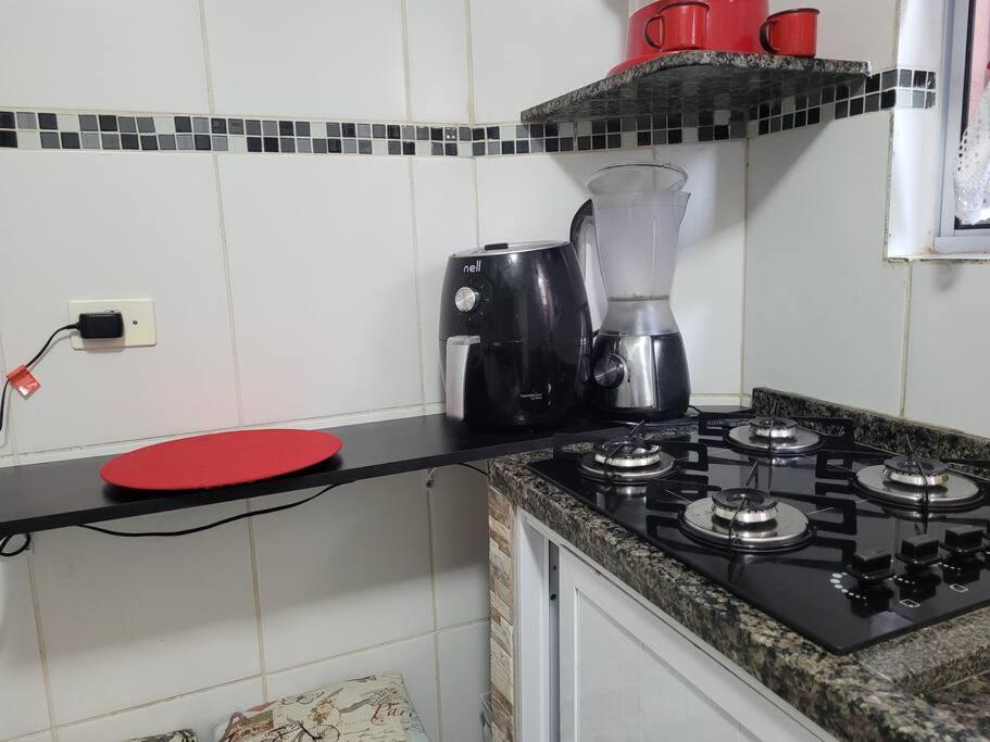 Sobrado de condominio Praia Grande VilaTupi com 2 dormitorio
