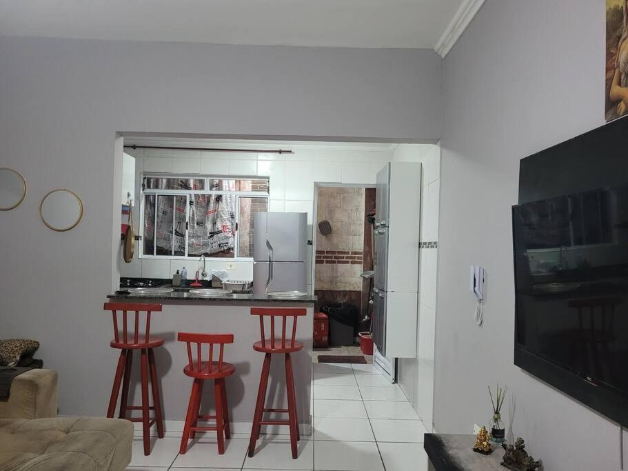 Sobrado de condominio Praia Grande VilaTupi com 2 dormitorio
