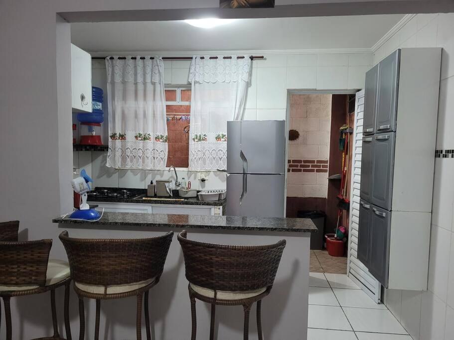 Sobrado de condominio Praia Grande VilaTupi com 2 dormitorio
