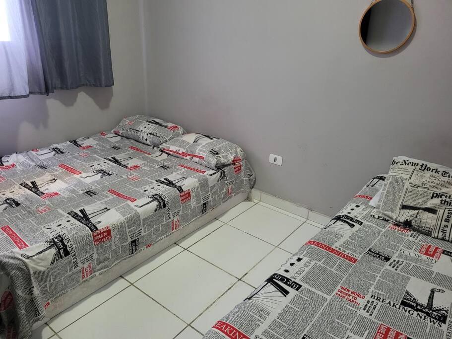 Sobrado de condominio Praia Grande VilaTupi com 2 dormitorio