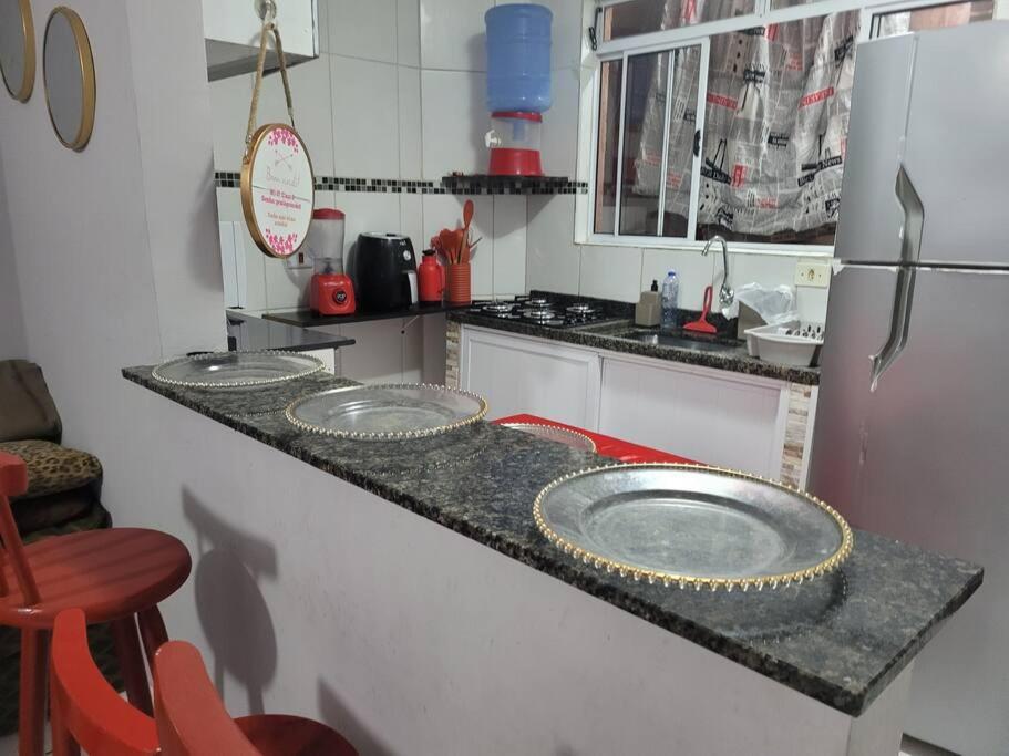 Sobrado de condominio Praia Grande VilaTupi com 2 dormitorio
