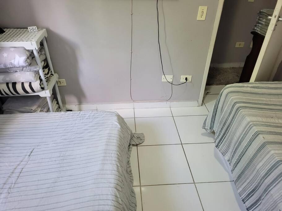 Sobrado de condominio Praia Grande VilaTupi com 2 dormitorio