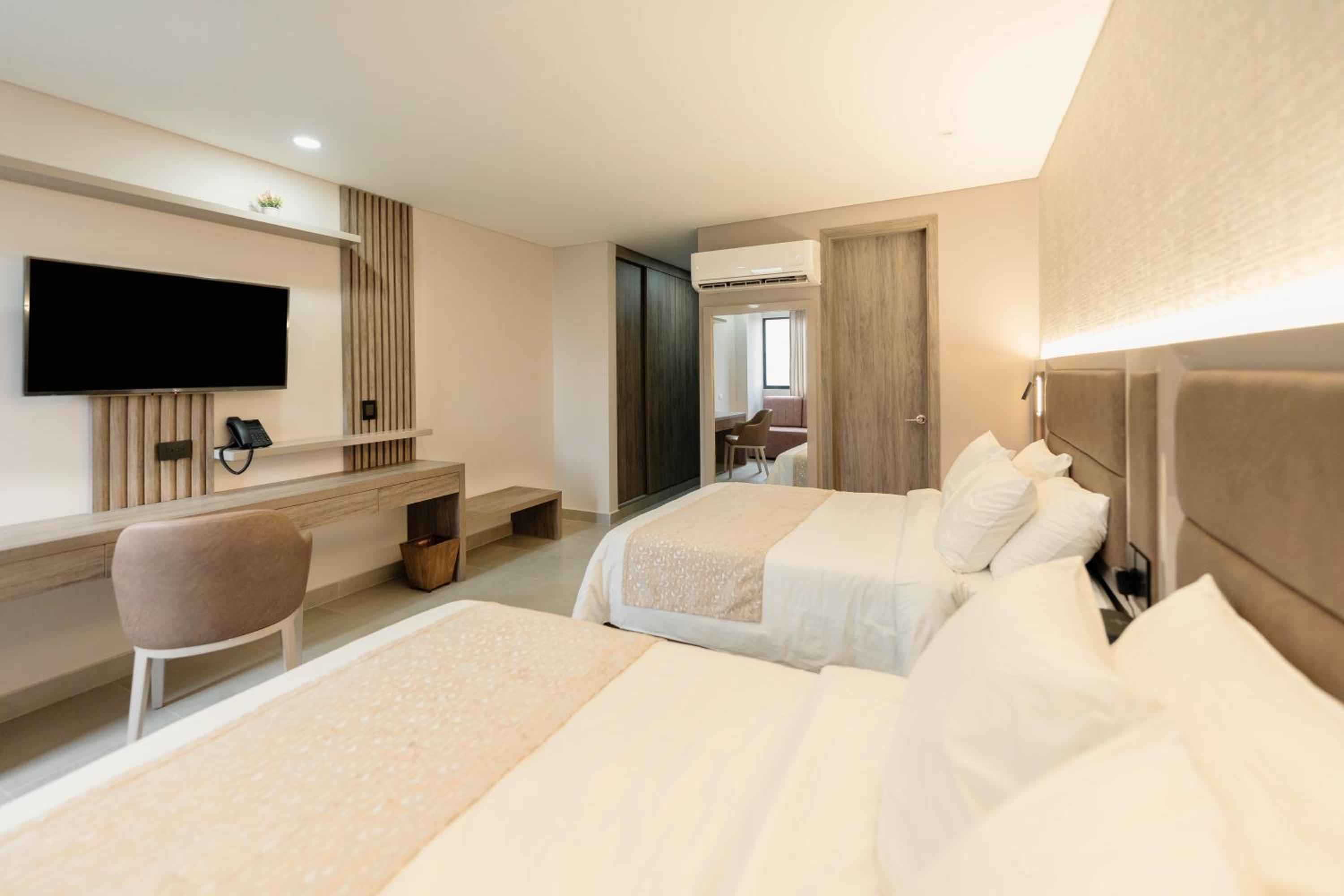 Hotel Amari Living Suites - Image 1