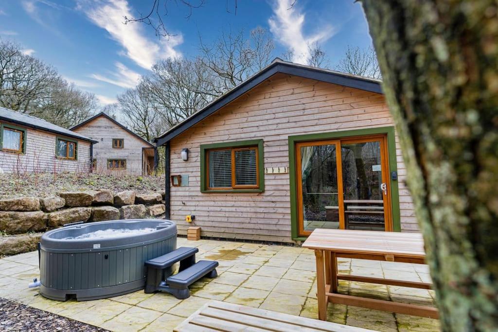 Padley; woodland lodge with hot tub for 2-4 in the Staffordshire Moorlands view 2