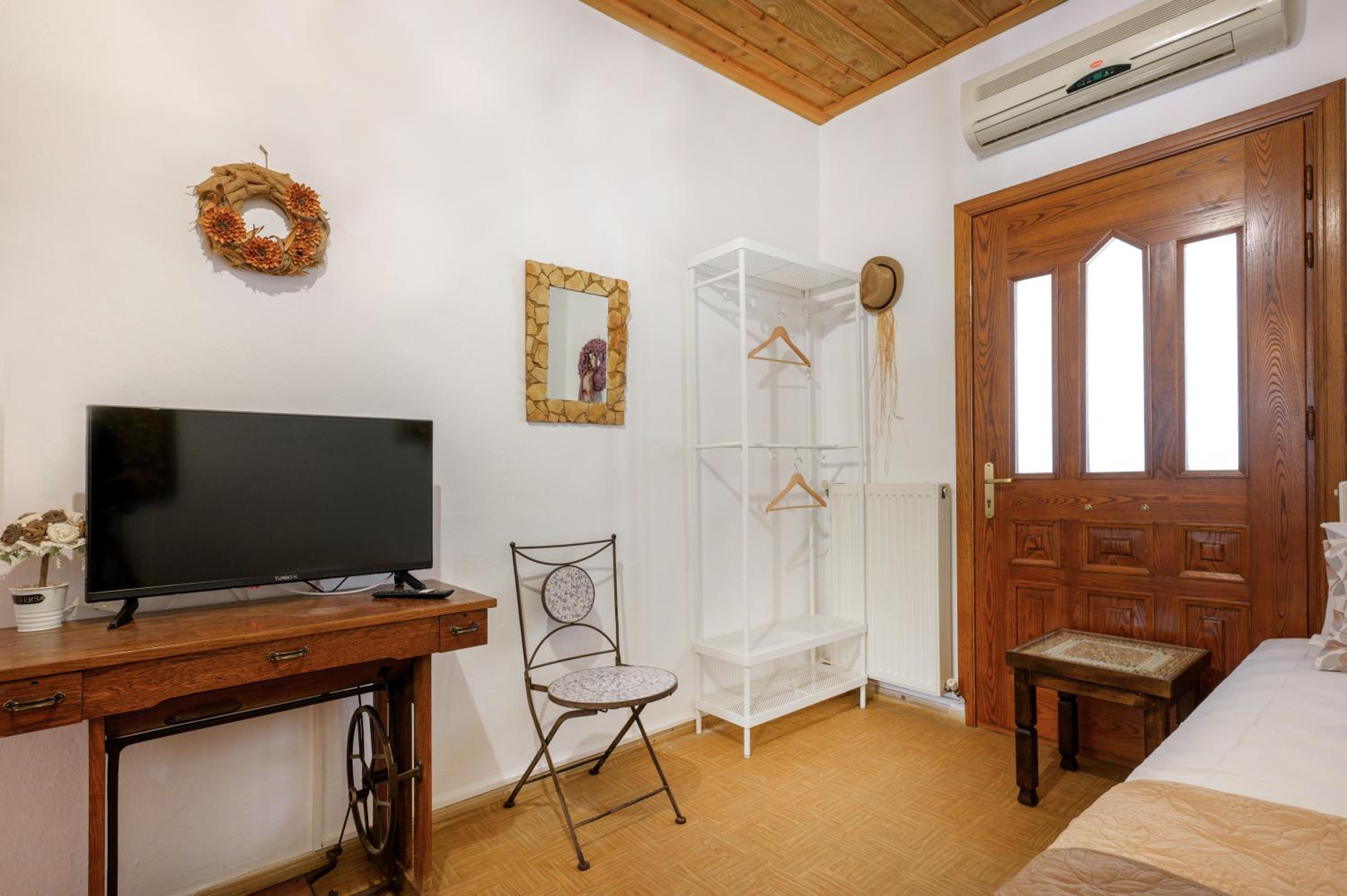 NIKOLAOS HOUSE