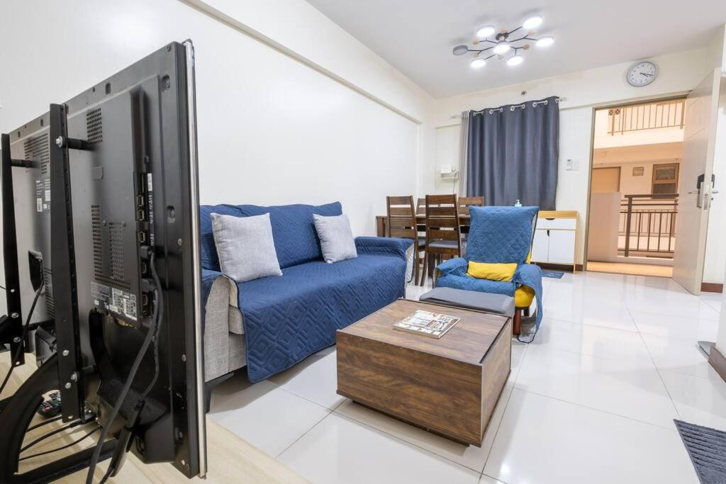 2BR Fully Air-Conditioned Staycation with Parking
