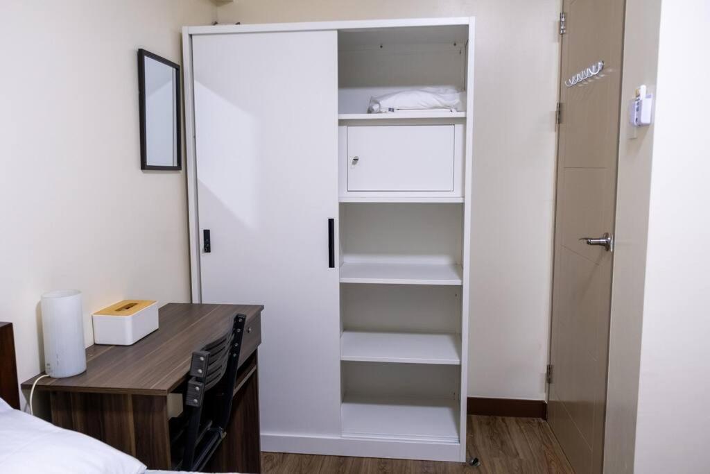 2BR Fully Air-Conditioned Staycation with Parking