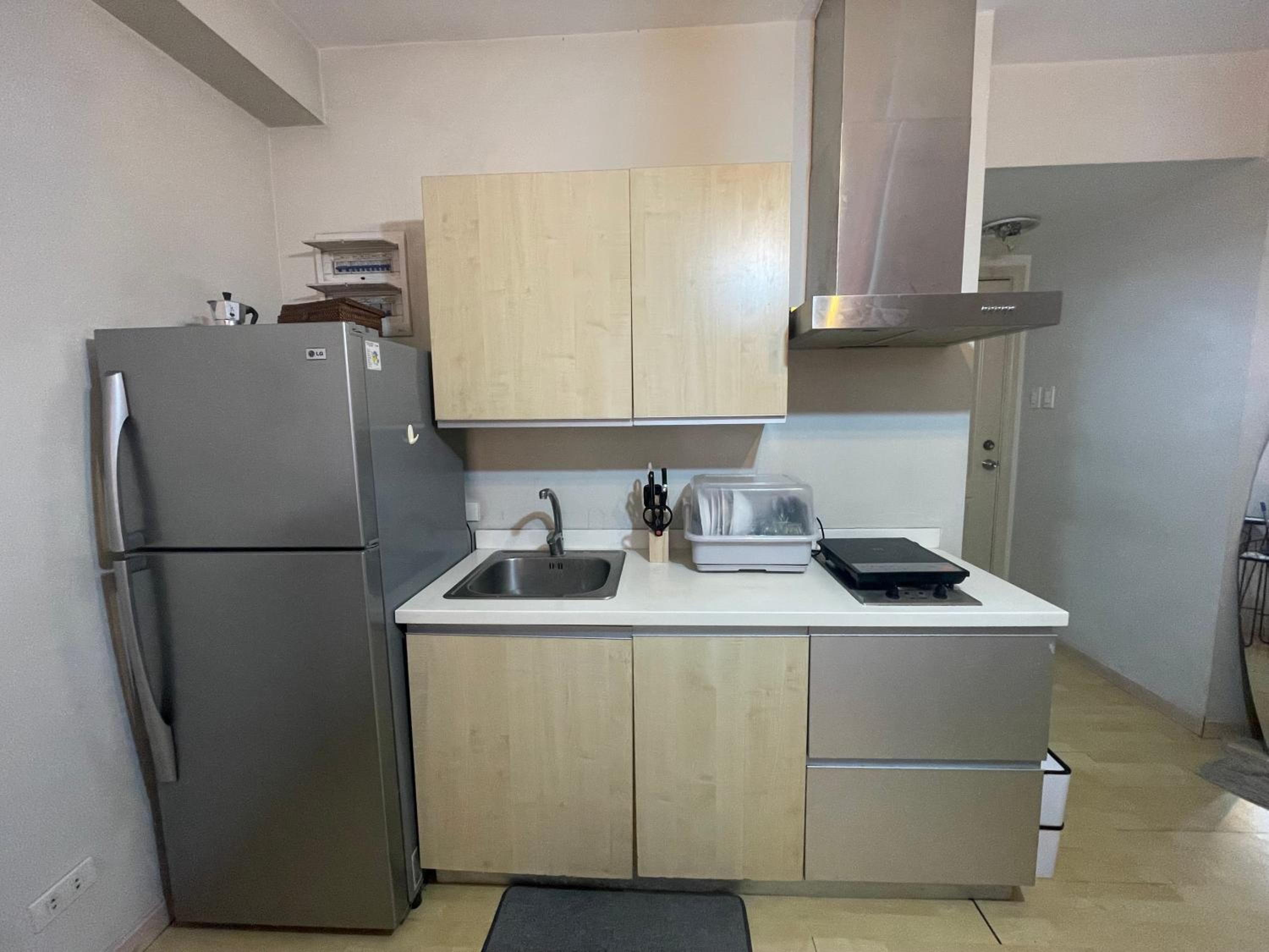 SOHO Central EDSA Shaw Condo Pool front with SMART TV photo 3