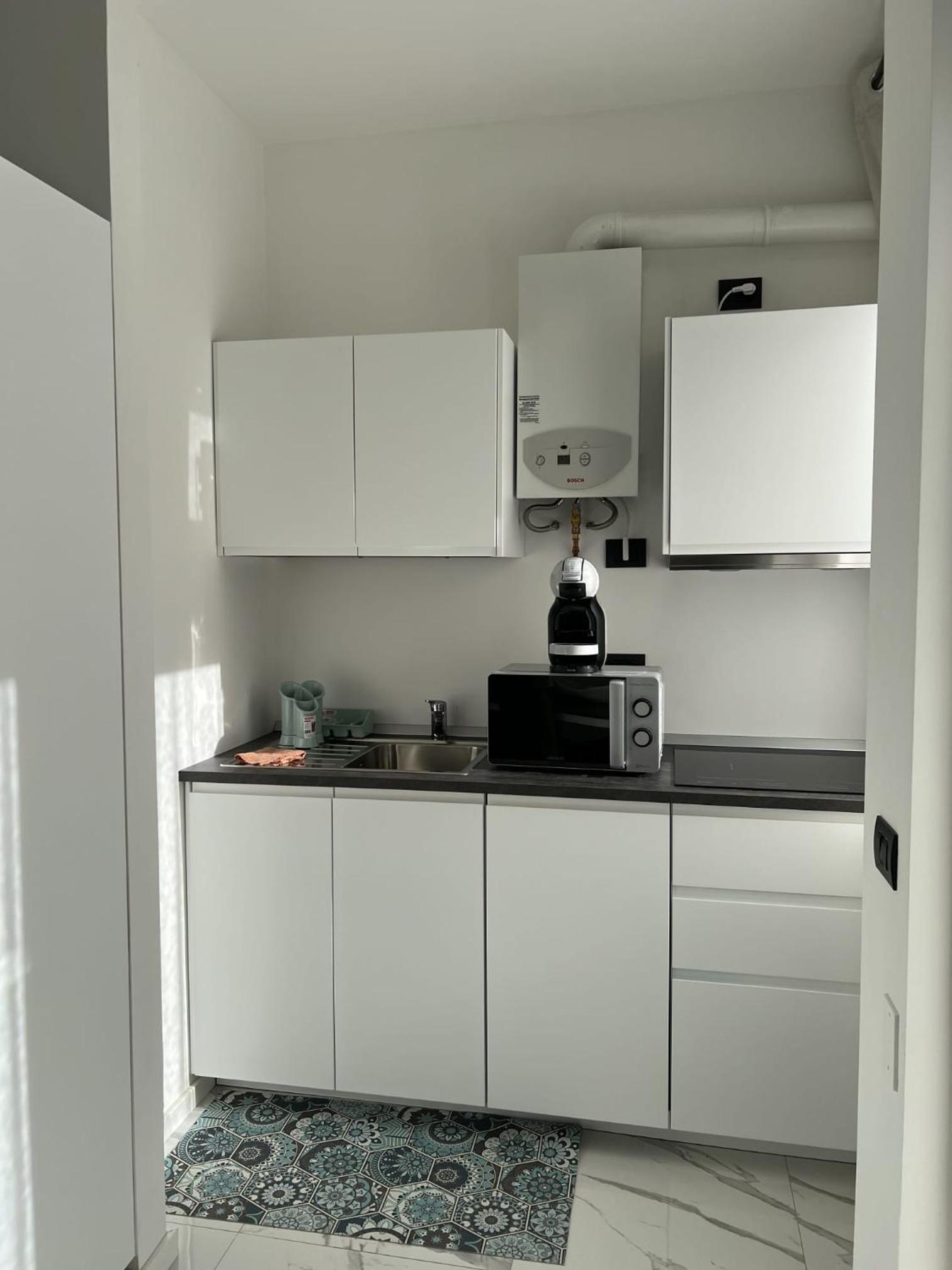 Clio home82 en Rozzano — kitchen
