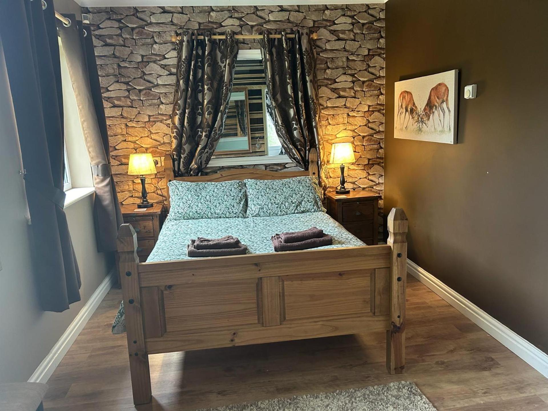 Cosy and secluded brook-side lodge view 2