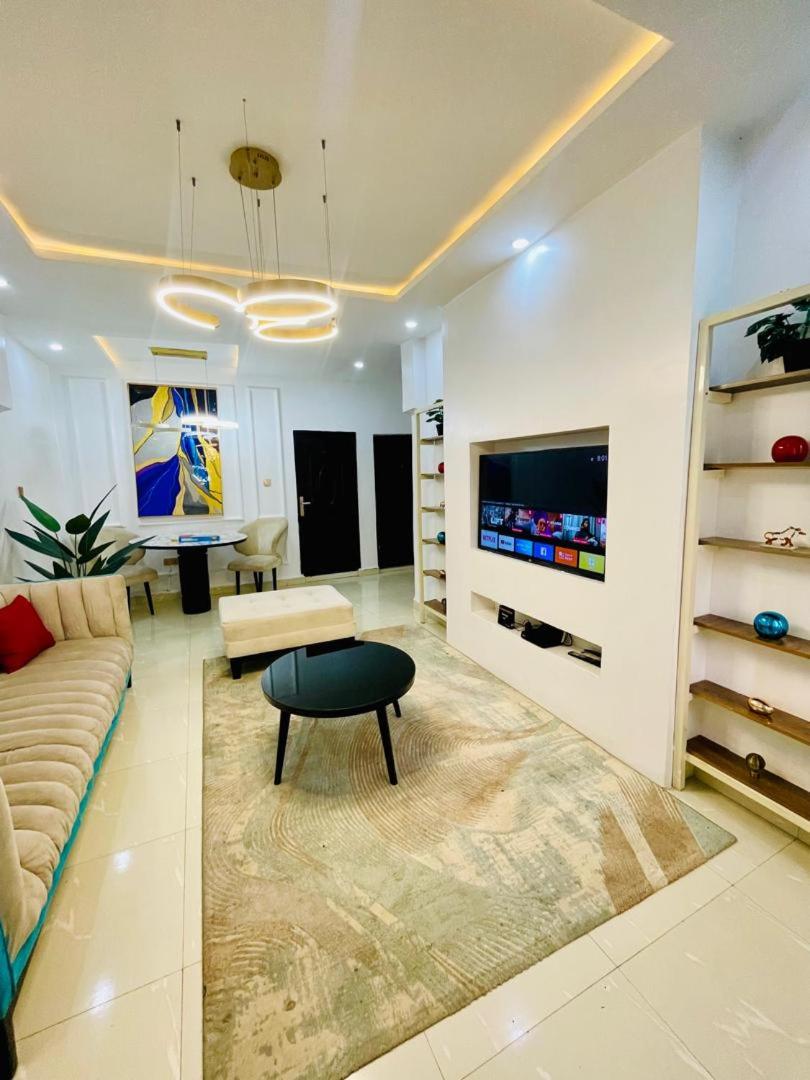 Central Oasis - Entire 3 Bedroom Apartment in Abuja with Pool, Games, WiFi, Balcony, and Garden view 4