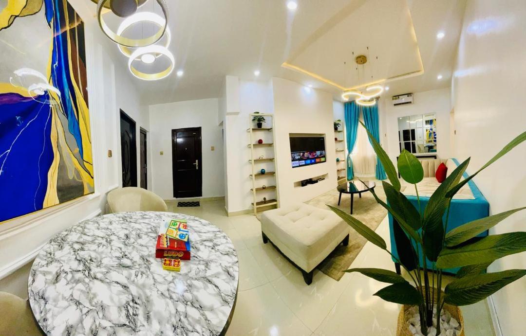 Central Oasis - Entire 3 Bedroom Apartment in Abuja with Pool, Games, WiFi, Balcony, and Garden view 5