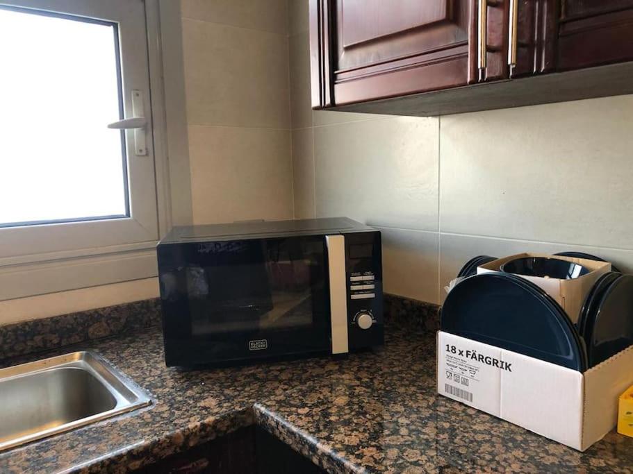 Sunny Bright 1BR in Palm Hills