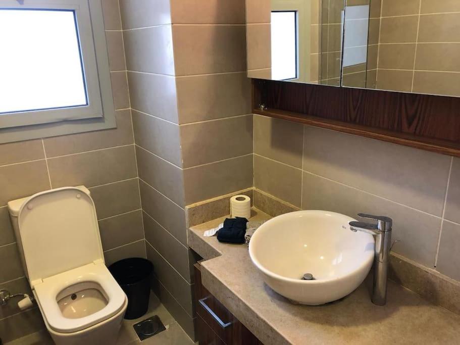 Sunny Bright 1BR in Palm Hills