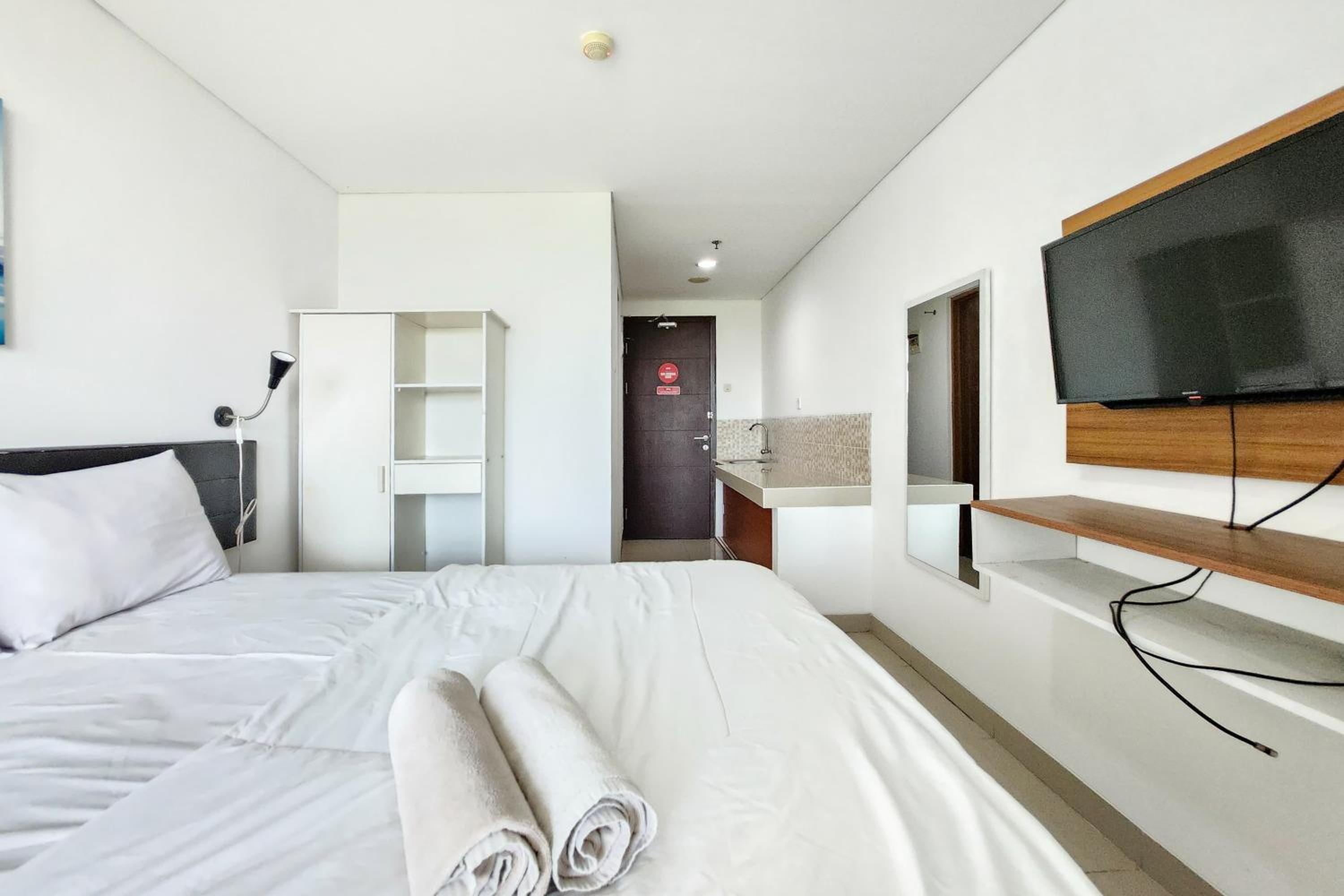 RedLiving Apartemen Enviro - Aurora Rooms view 3