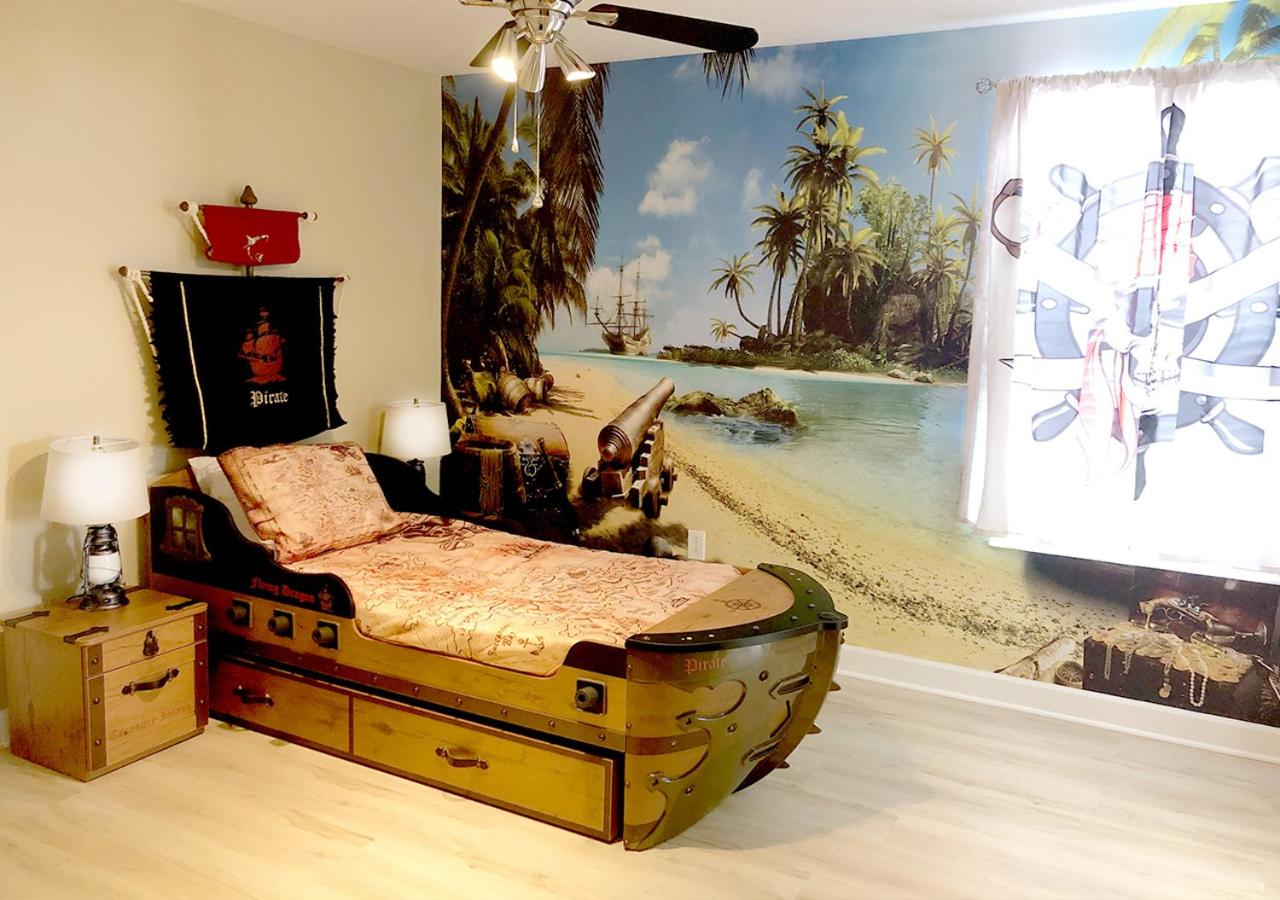 Mickey's Mansion, a Luxury, Themed-Home with Private Pool, Arcade and Theater as well as 3 Shared Waterslides, 3 Swimming Pools, 2 Children's Splash Pads,  view 5