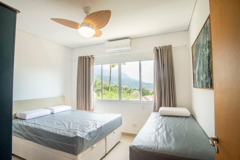 Perto da Praia Casa Lehua Feiticeira 1, (4 suítes)
