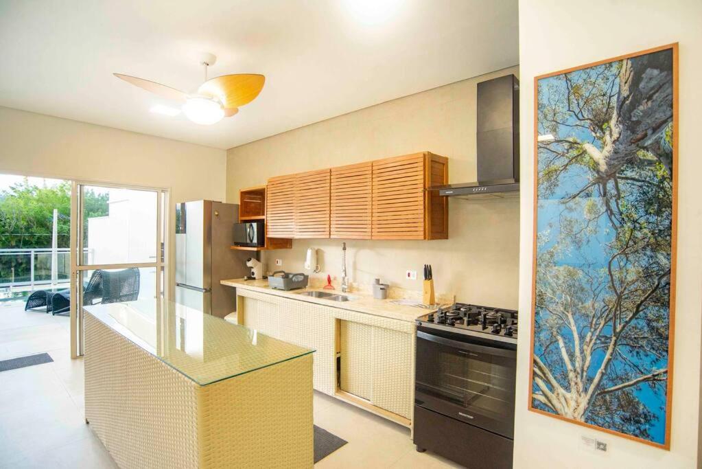 Perto da Praia Casa Lehua Feiticeira 1, (4 suítes)