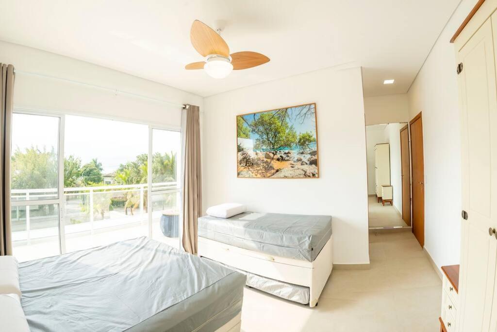 Perto da Praia Casa Lehua Feiticeira 1, (4 suítes)