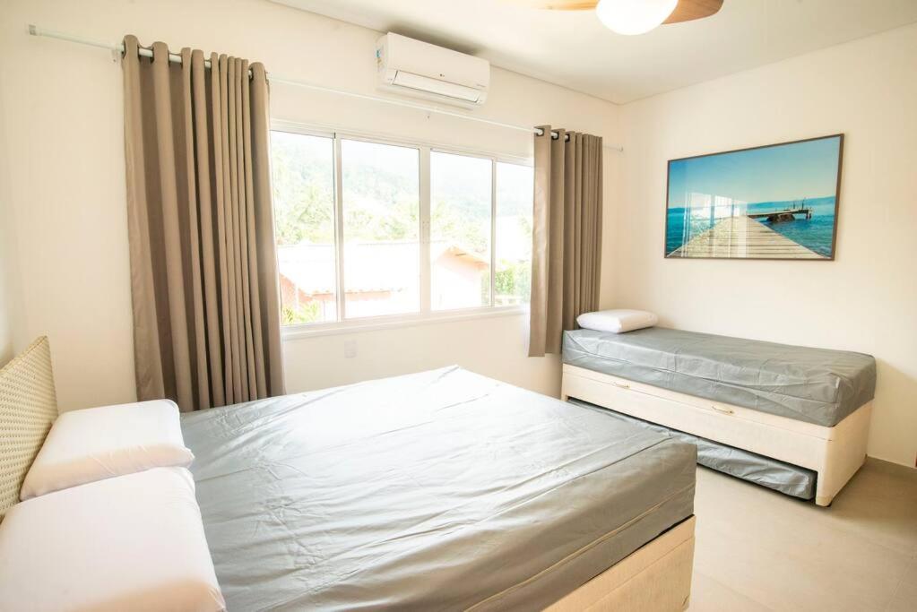 Perto da Praia Casa Lehua Feiticeira 1, (4 suítes)