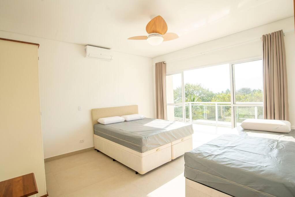 Perto da Praia Casa Lehua Feiticeira 1, (4 suítes)
