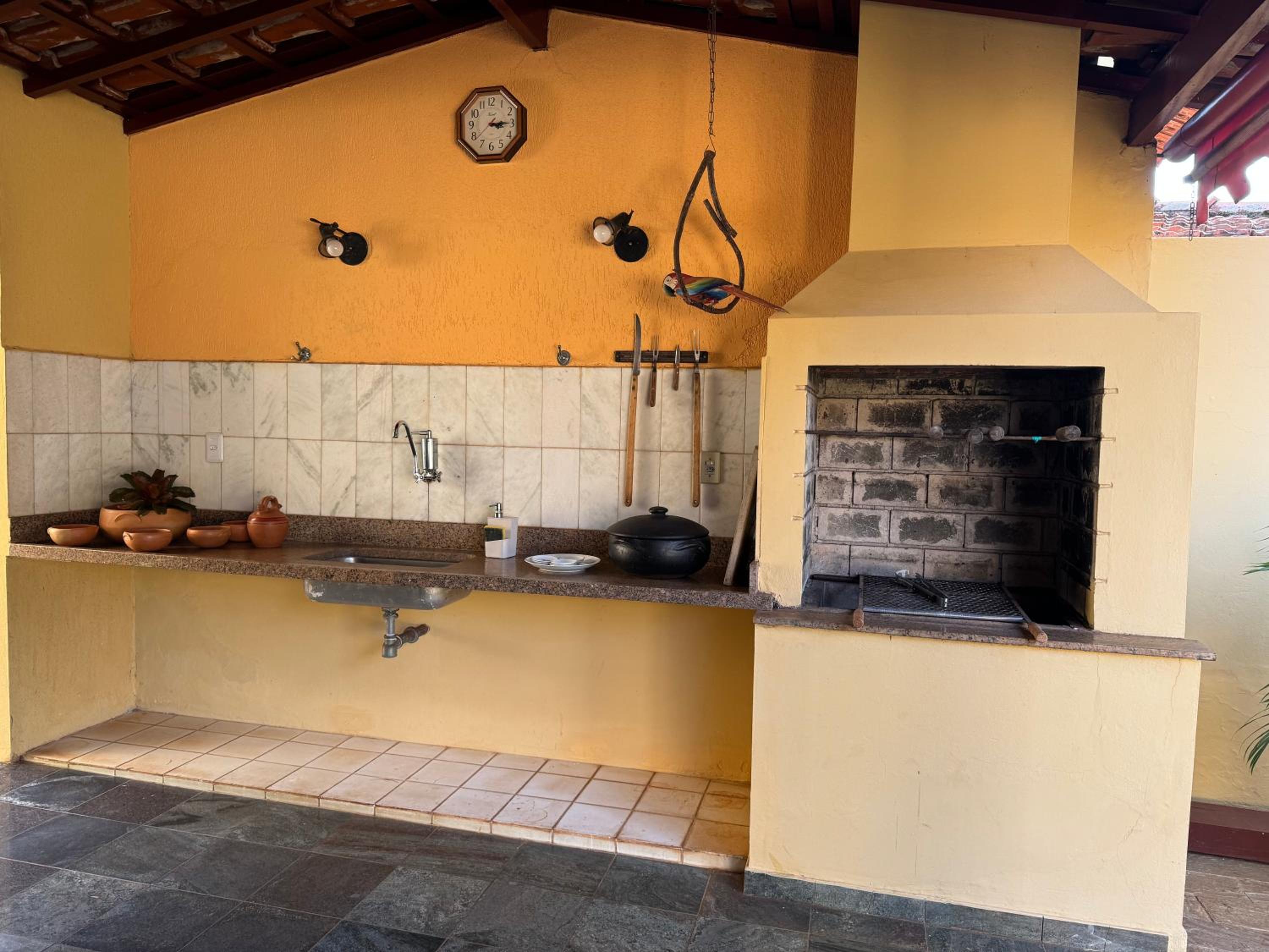 Casa da Vó Loy e seu espaço verde
