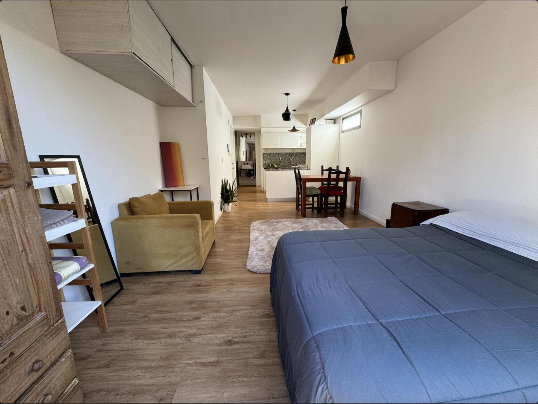 Apartment with balcony, garden and parrilla