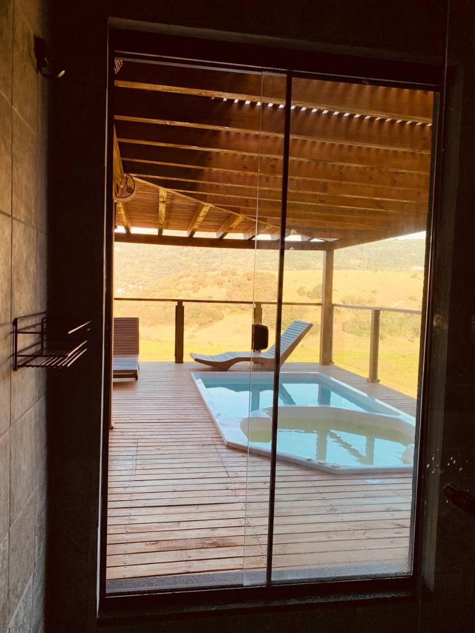 Casa com jacuzzi e piscina aquecida- Praia do Rosa-SC