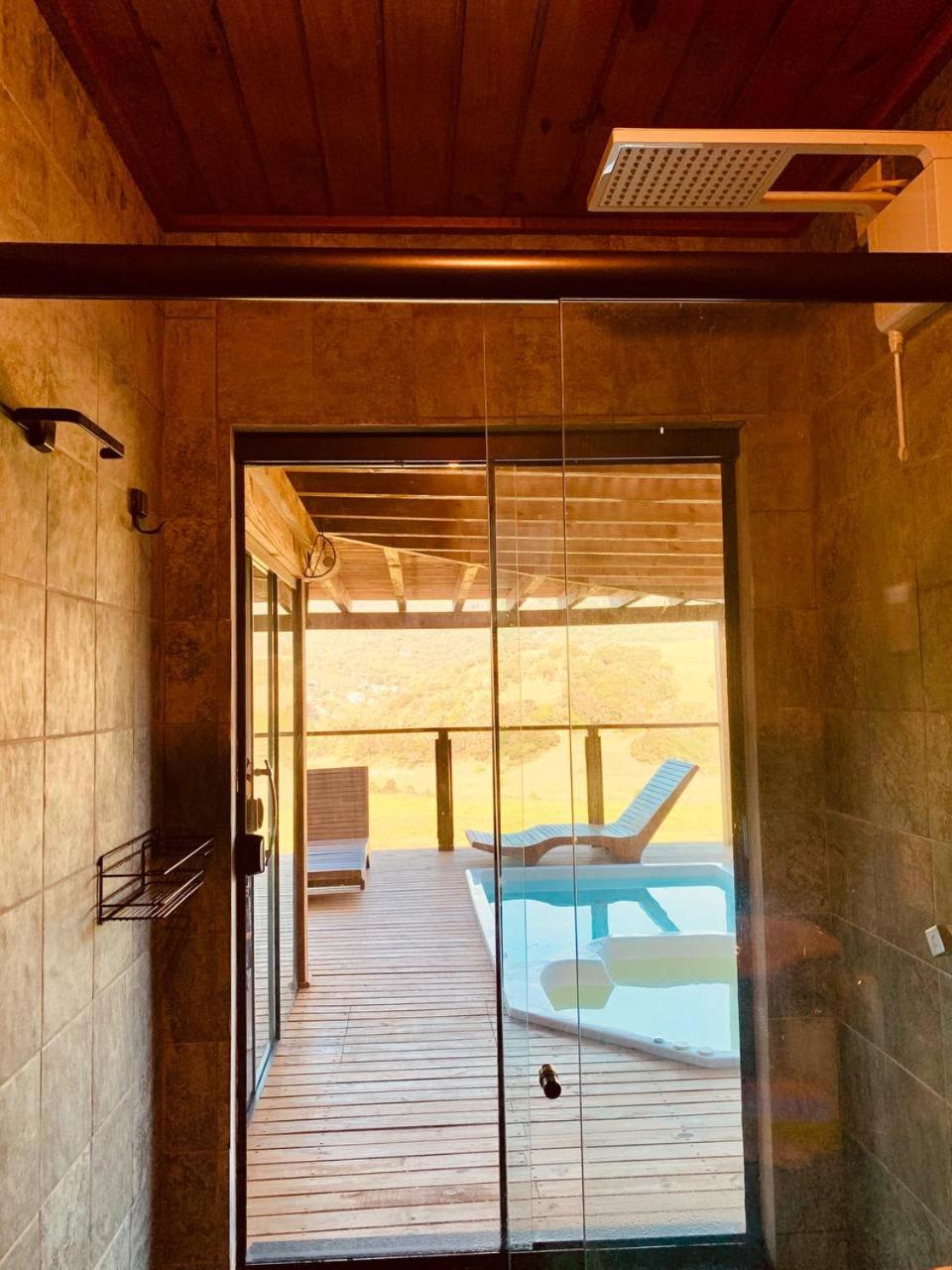 Casa com jacuzzi e piscina aquecida- Praia do Rosa-SC
