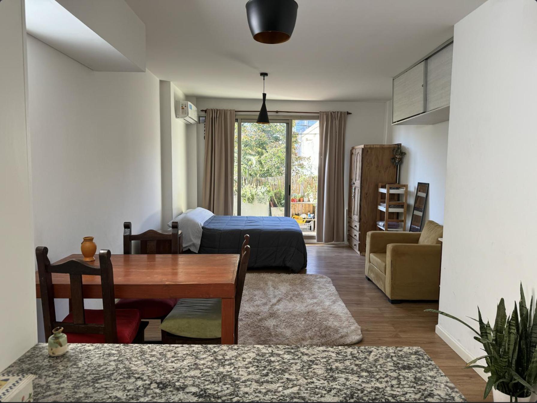 Apartment with balcony, garden and parrilla