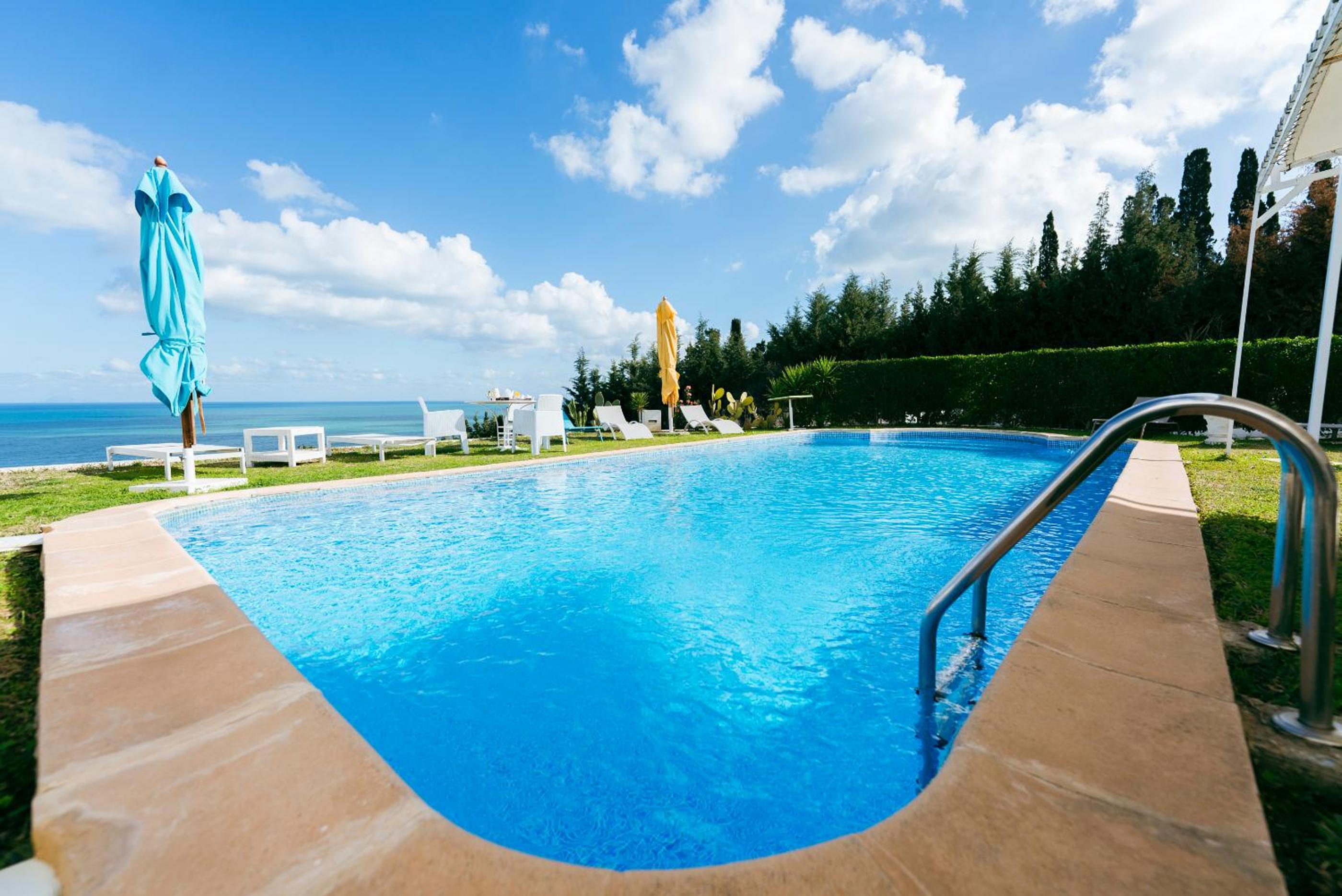 Oasis Santorina Pool Sea Sky view 4