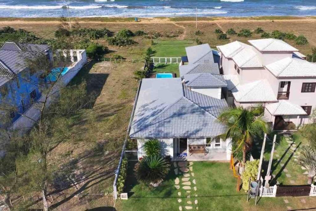 Casa long beach! Totalmente pé na areia.
