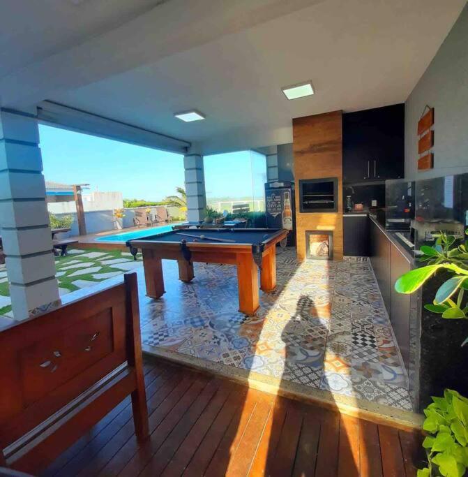 Casa long beach! Totalmente pé na areia.