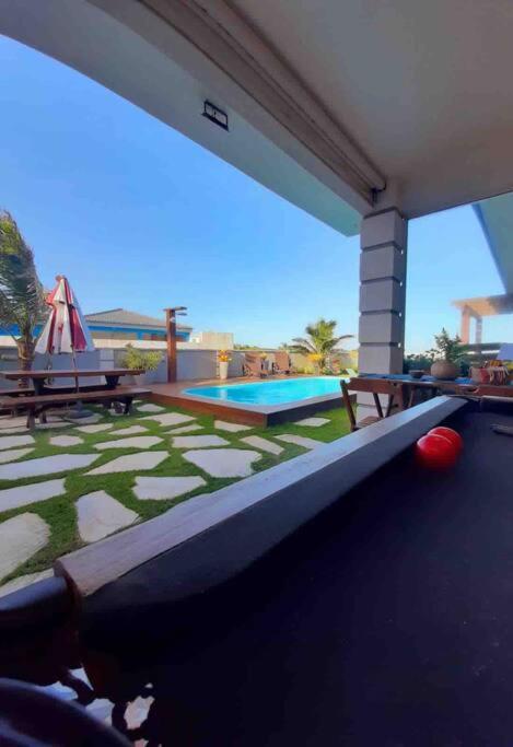 Casa long beach! Totalmente pé na areia.