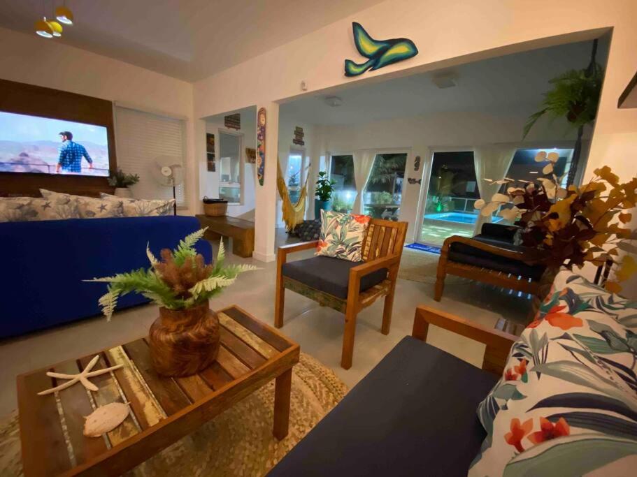Casa long beach! Totalmente pé na areia.