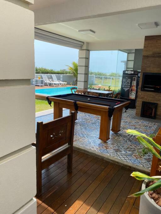 Casa long beach! Totalmente pé na areia.