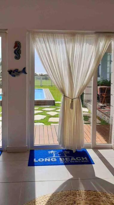 Casa long beach! Totalmente pé na areia.