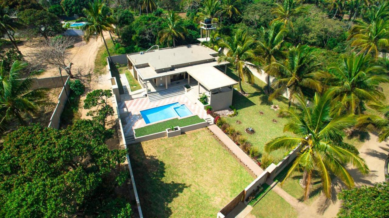 Bilene beige beach house view 4