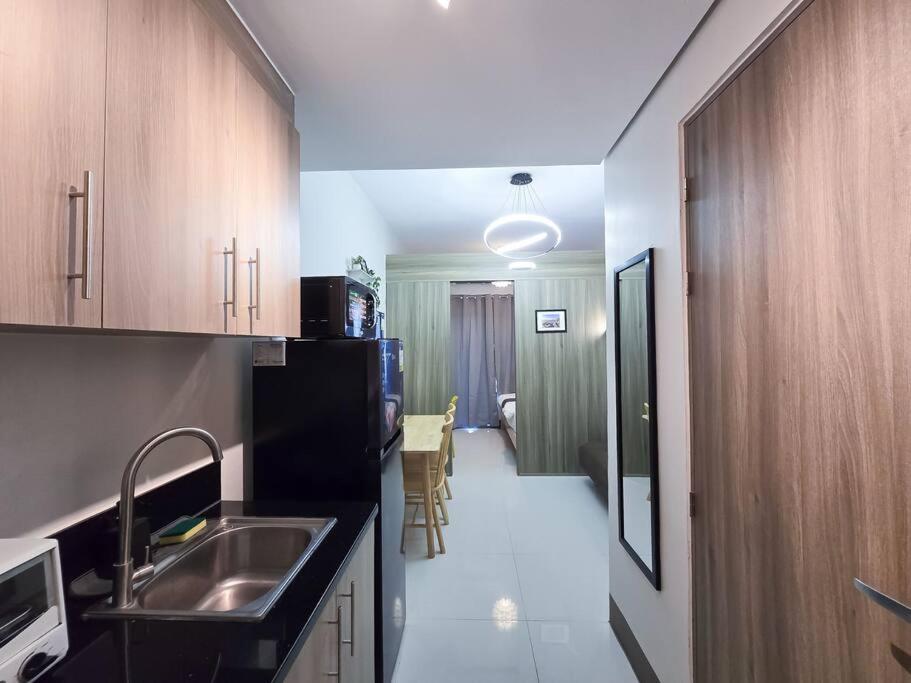 1BR Condotel with Balcony at FAME Residences #FM31