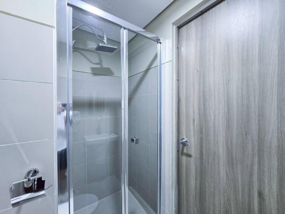 1BR Condotel with Balcony at FAME Residences #FM31