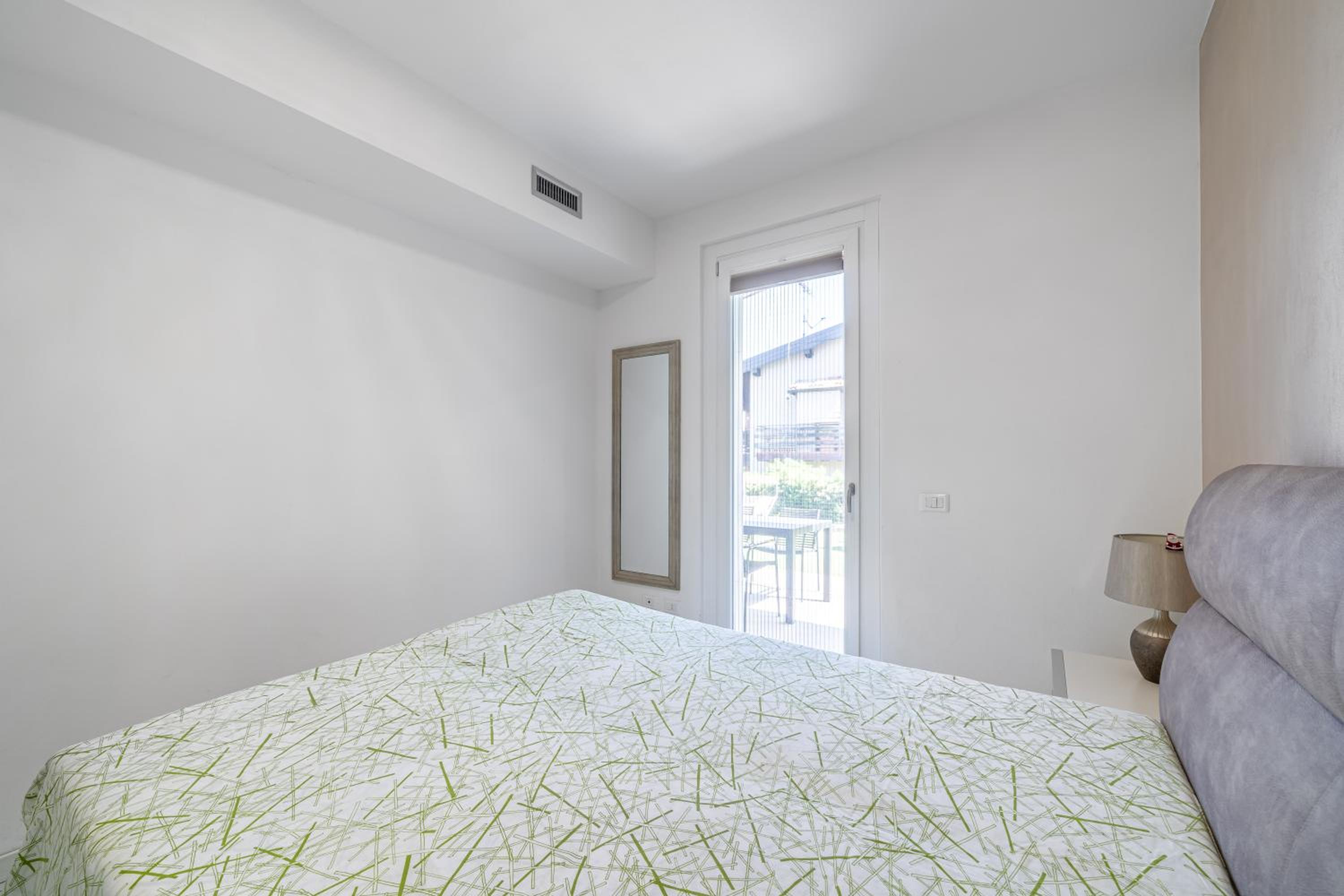 HOST4U - Garda Lake Lido Apartments With Pool, Garden and Private Parking in Garage view 4