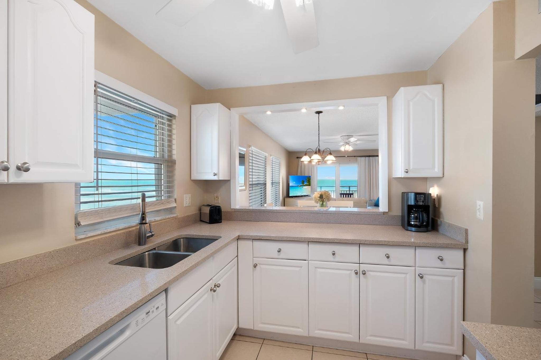 Marvel at the spectacular views from this bright corner condo!