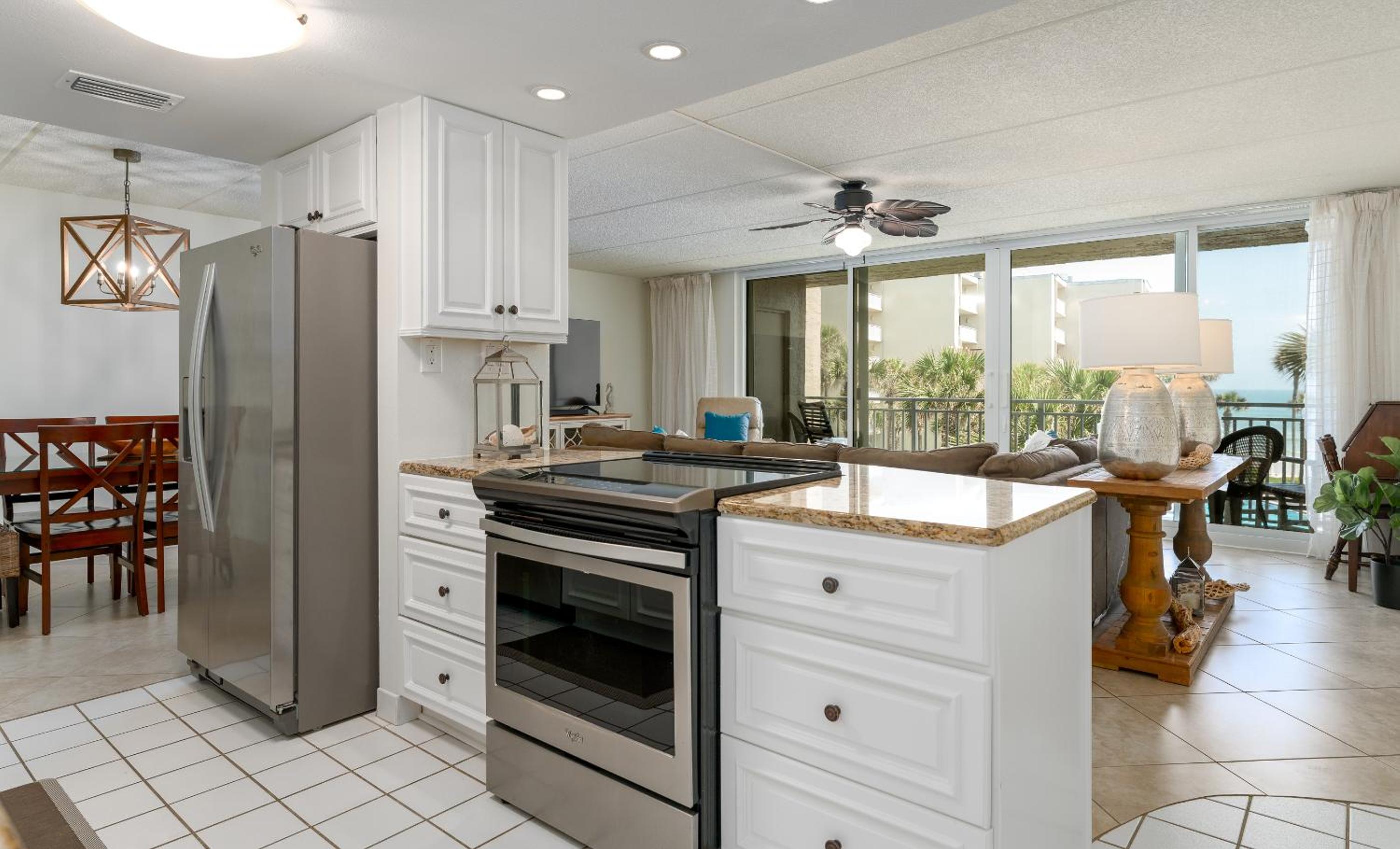 Coastal condo with beachfront views and pool access!
