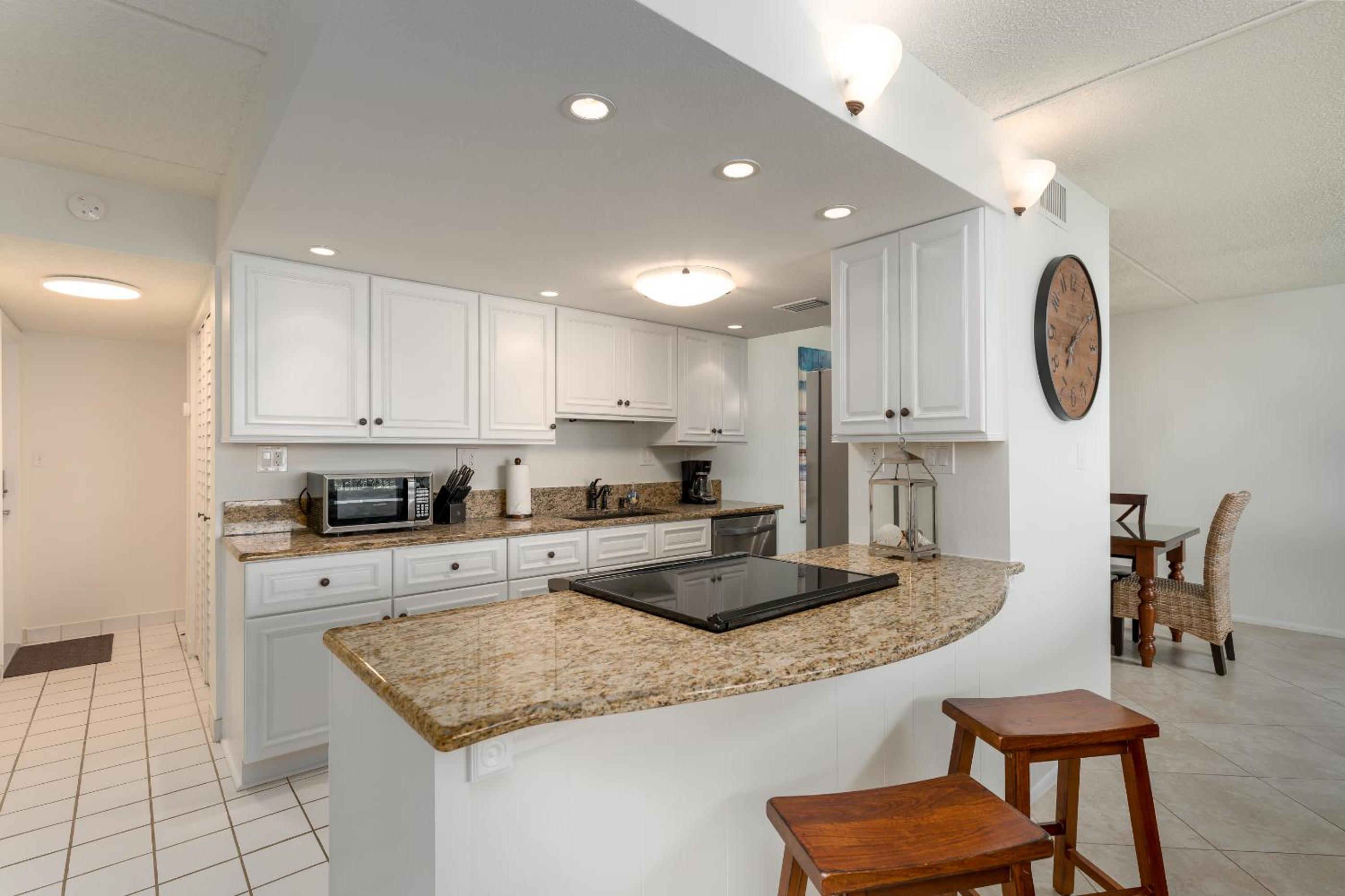 Coastal condo with beachfront views and pool access!