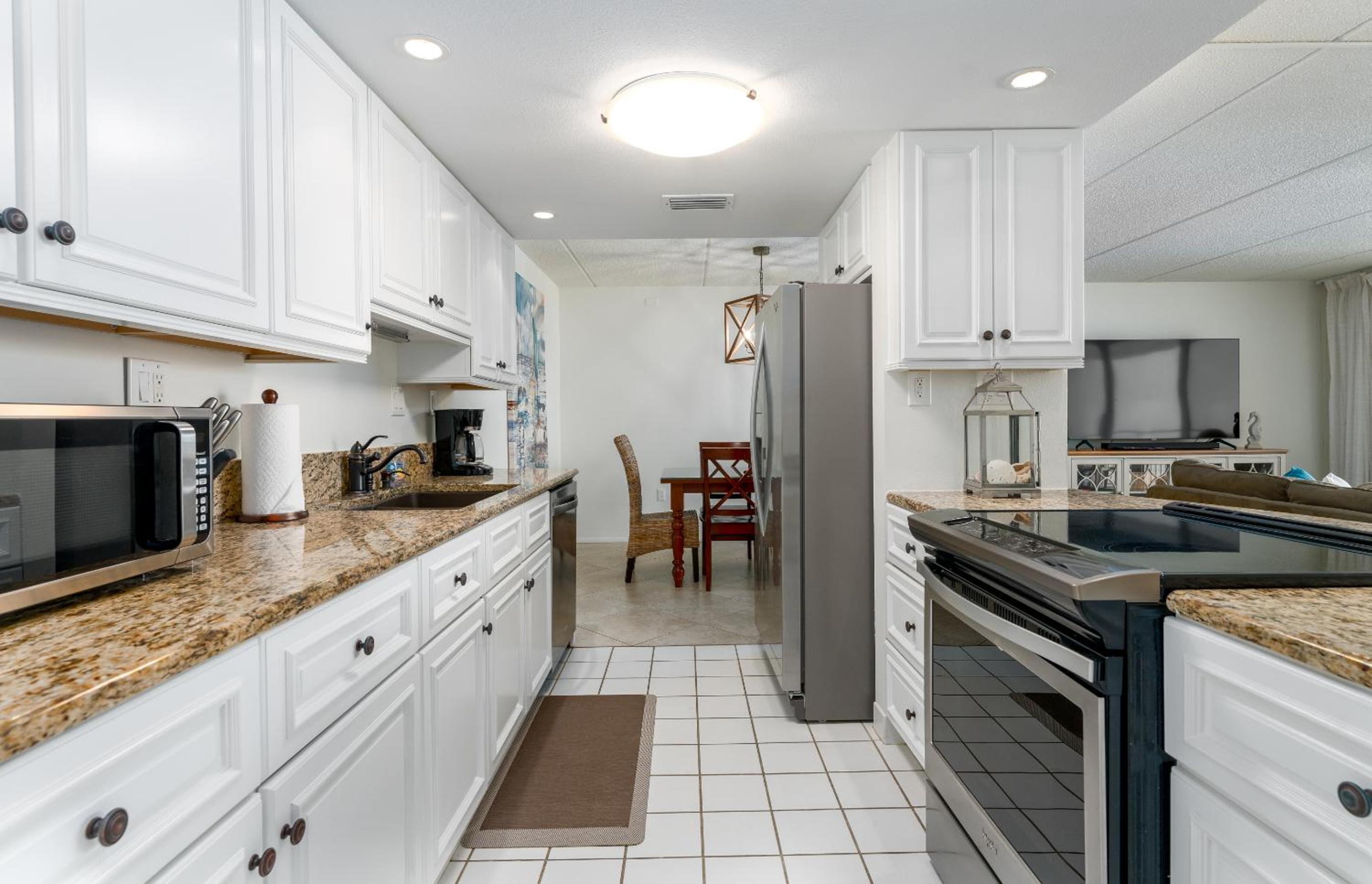 Coastal condo with beachfront views and pool access!