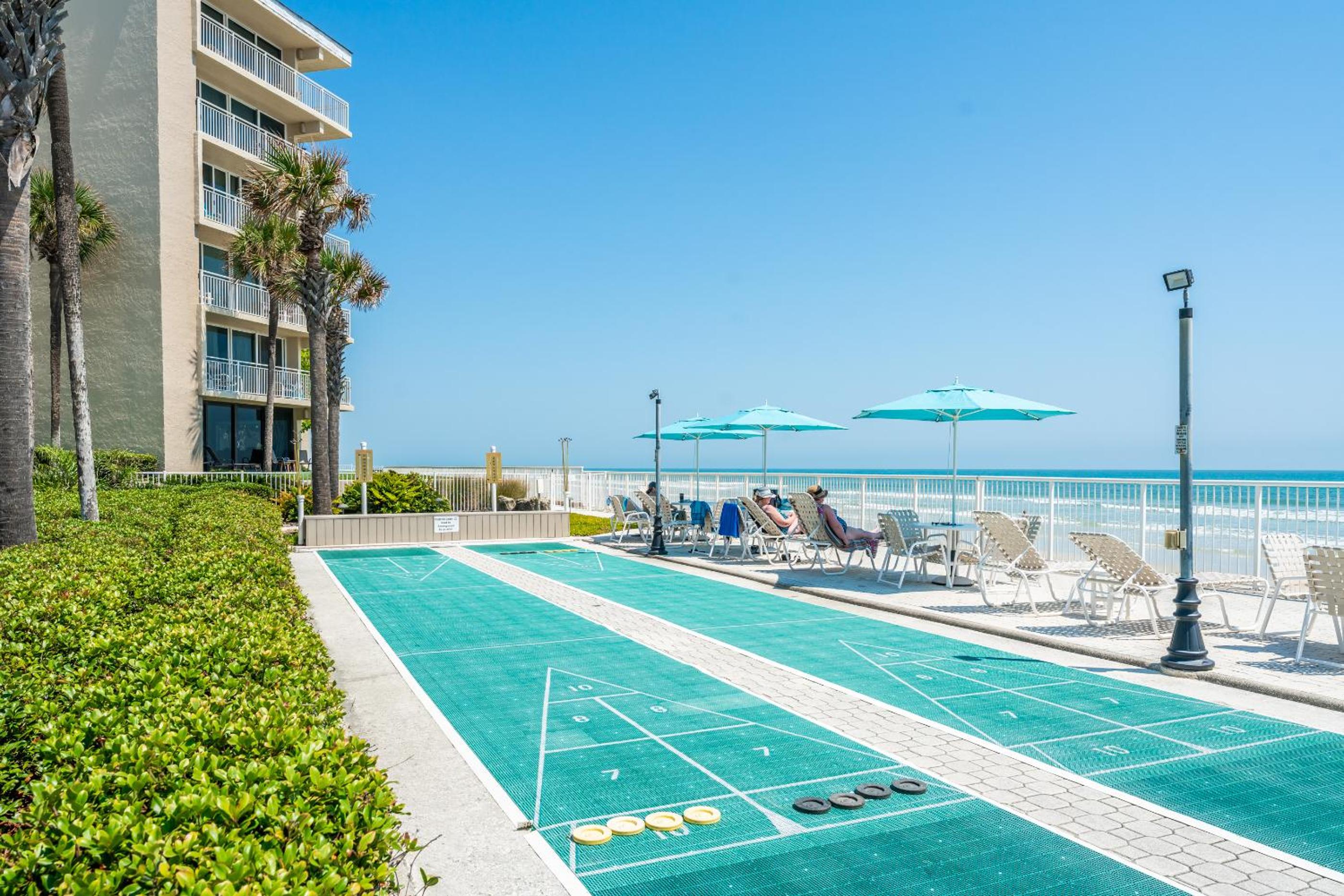 Coastal condo with beachfront views and pool access!
