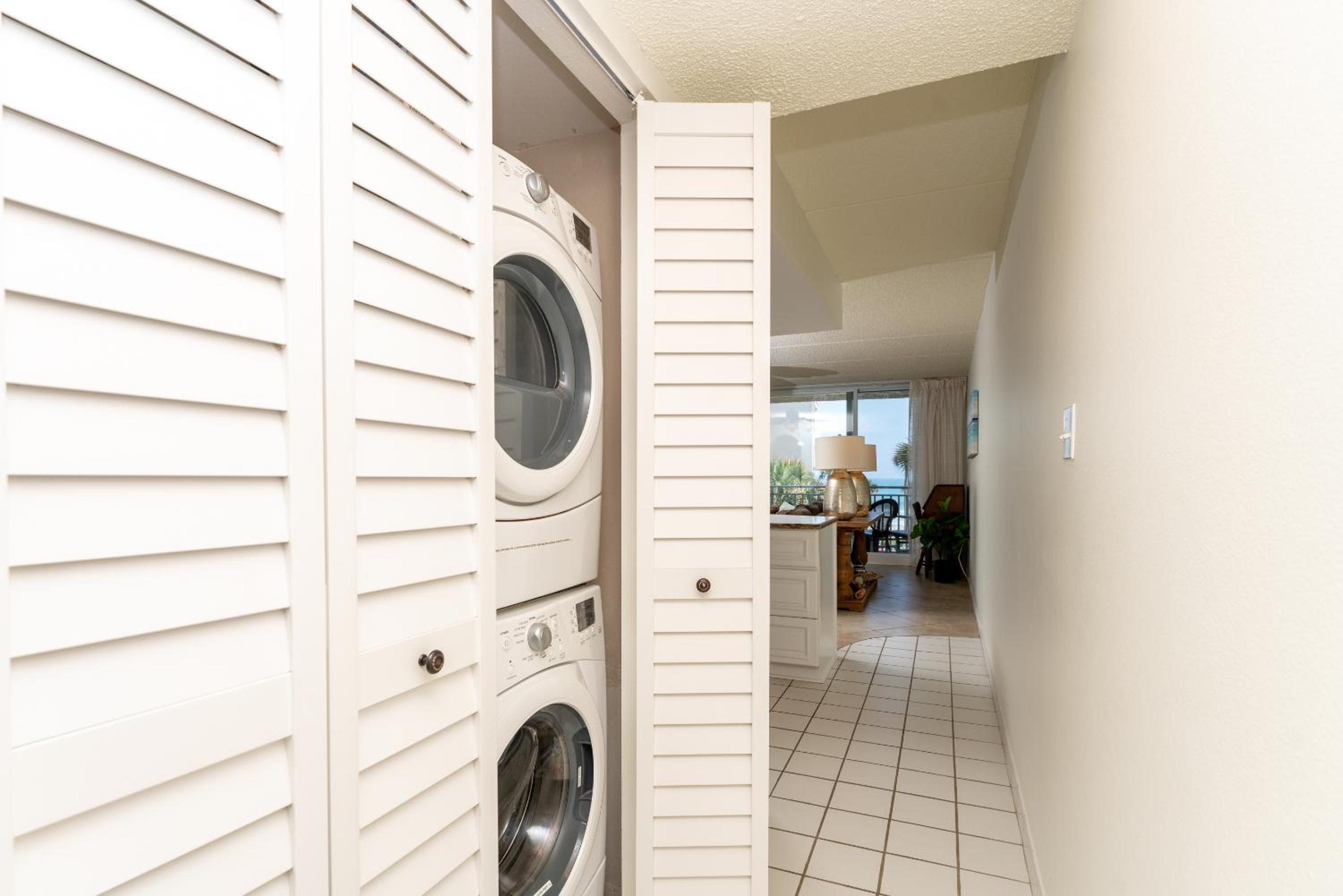 Coastal condo with beachfront views and pool access!