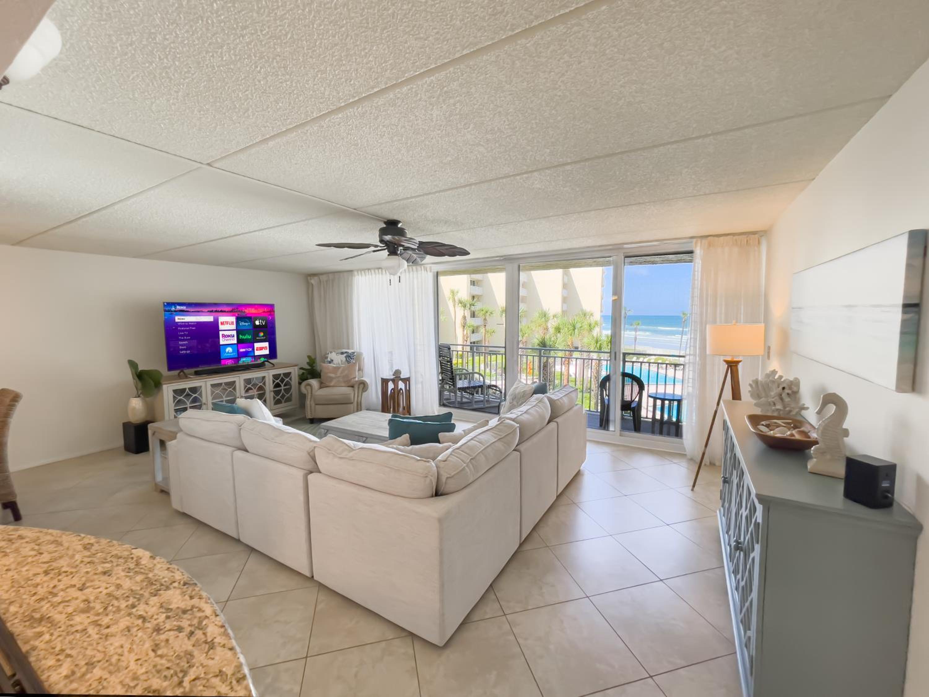 Coastal condo with beachfront views and pool access!