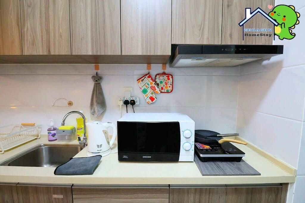 Central Park lovely cozy studio balcony by GDRAGON HomeStay