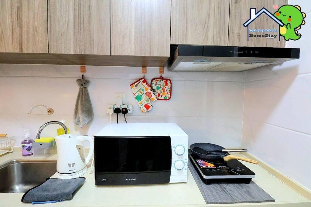 Central Park lovely cozy studio balcony by GDRAGON HomeStay